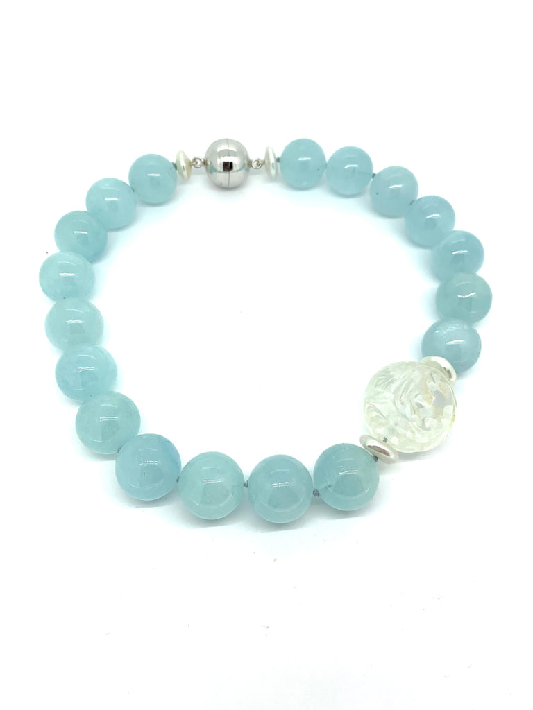 Large Aquamarine bead necklace with a Carved Crystal bead accented with button pearls